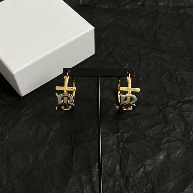 Burberry Ear Studs, Featuring The Brand's Iconic Logo Inspired By Founder Thomas Burberry Ear Studs, Featuring The Brand's Iconic Logo Inspired By Founder Thomas