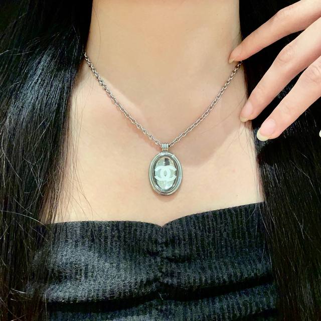 Chanel vintage letter necklace. Chanel's styles really need no introduction. Eac