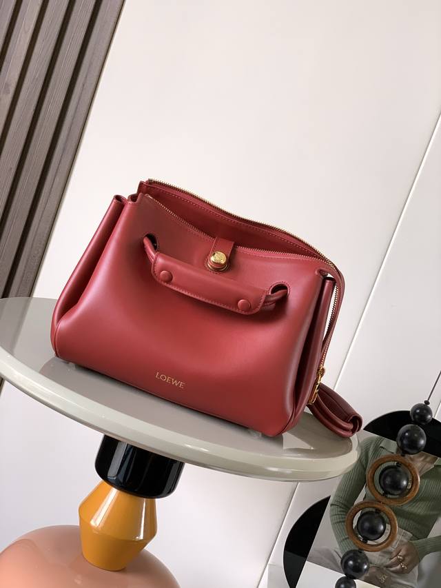 Small soft cowhide leather Madrid handbag Madrid has a soft structured trapezoid Small soft cowhide leather Madrid handbag Madrid has a soft structured trapezoid