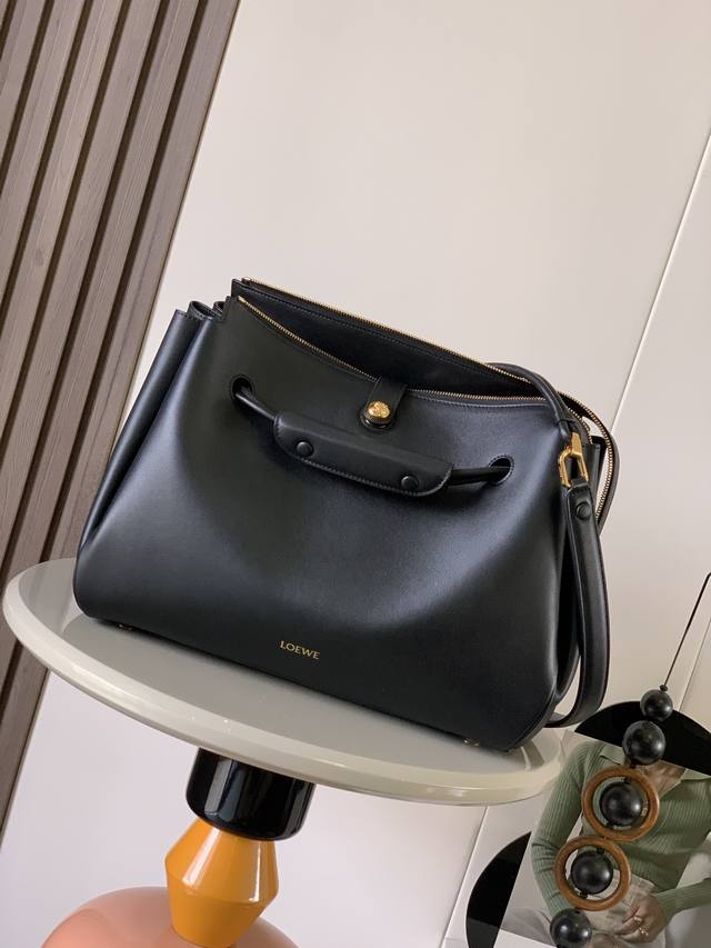Large Soft Calfskin Madrid HandbagMadrid has a soft structured trapezoidal shape Large Soft Calfskin Madrid HandbagMadrid has a soft structured trapezoidal shape