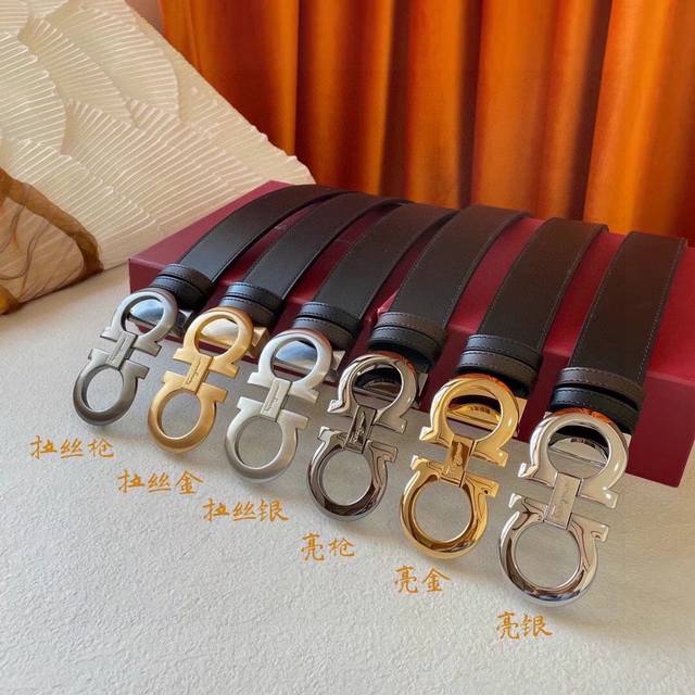 Salvatore Ferragamo double-sided imported calfskin belt. Black and brown, revers