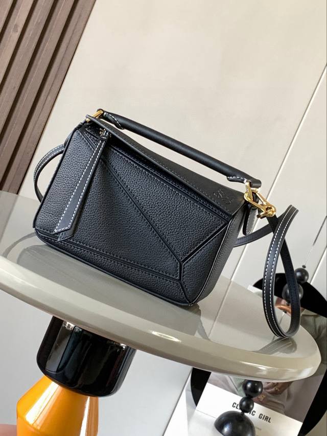 The popular geometric bag, the mini 18cm Puzzle handbag in imported nappa calfsk