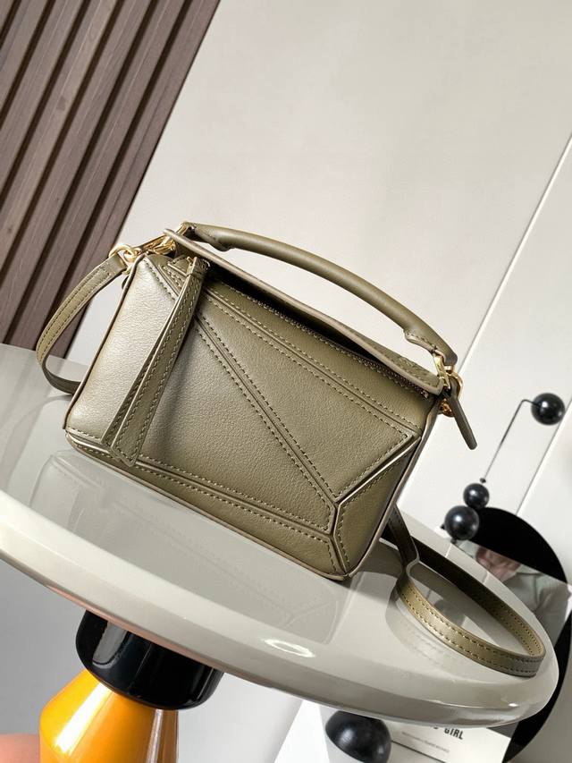 The popular geometric bag, the mini 18cm Puzzle handbag in imported nappa calfsk