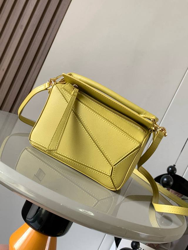 The popular geometric bag, the mini 18cm Puzzle handbag in imported nappa calfsk
