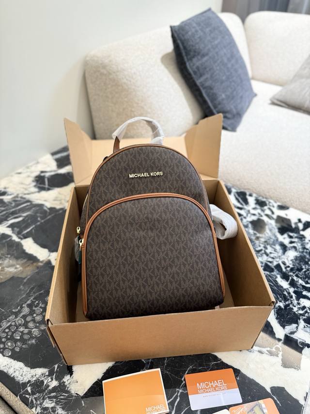Mk Backpack The latest Abbey series backpack with small print and monogram, spac Mk Backpack The latest Abbey series backpack with small print and monogram, spac