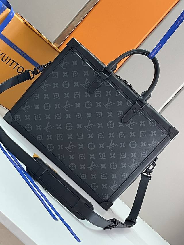 The Soft Trunk briefcase, 44952, is crafted from Monogram Eclipse canvas in a bo