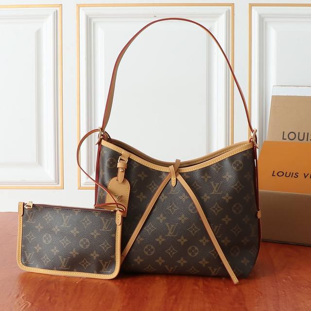 This updated version of the original M46203 Carryall Small is crafted from Mono This updated version of the original M46203 Carryall Small is crafted from Mono