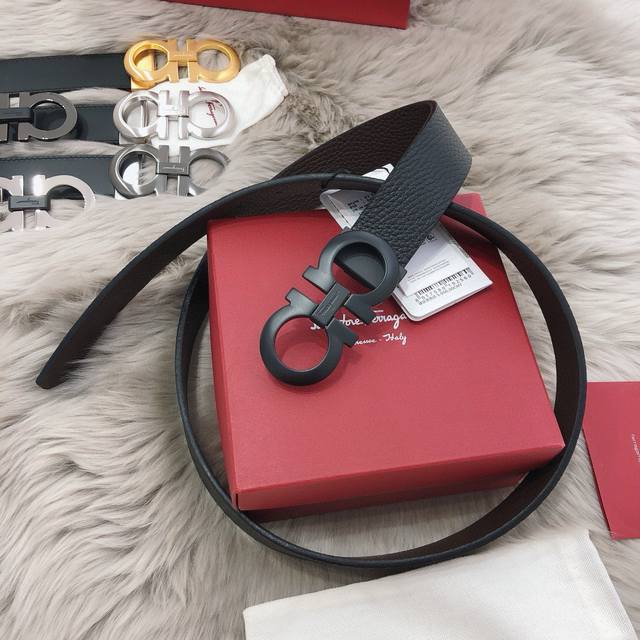 This Ferragamo belt features a modern take on the classic Gancini buckle. Doubl This Ferragamo belt features a modern take on the classic Gancini buckle. Doubl