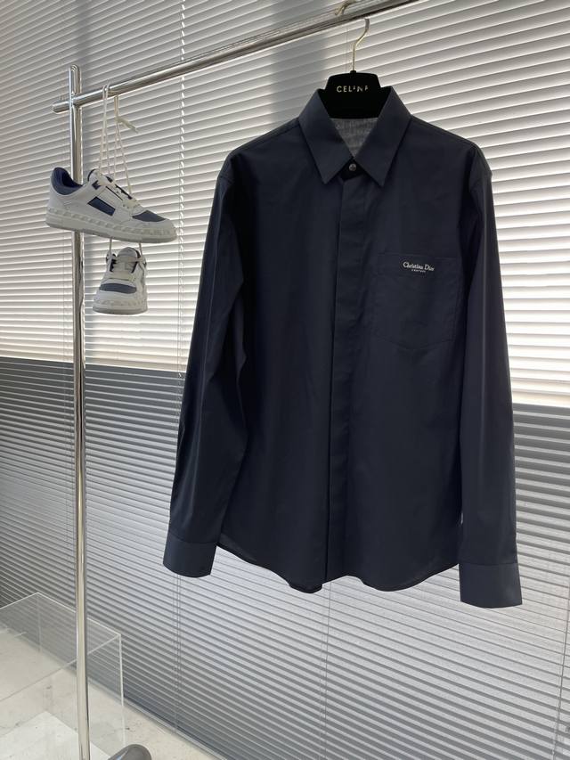 Autumn/Winter -Dio pocket embroidered detail poplin shirt. Concealed button styl