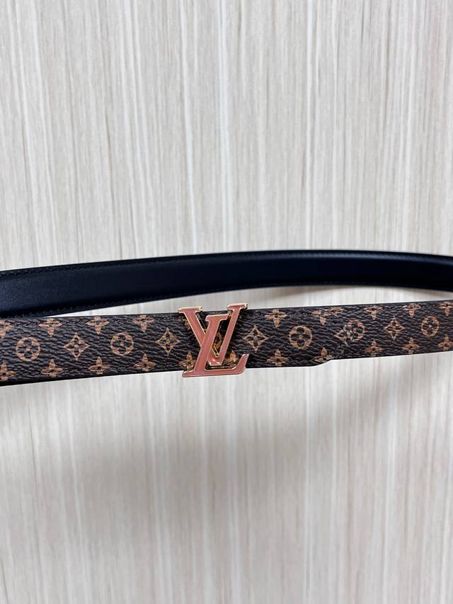 2.0 wide canvas with white floral print, black calfskin with a raised, pointed,