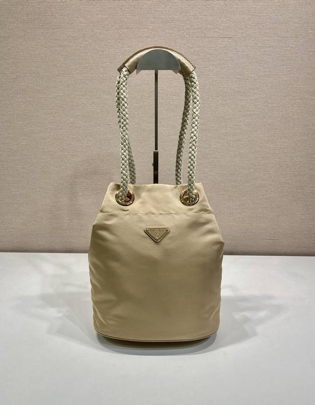 New Bucket Bag 1Be082 Runway Style This Re-Nylon handbag is designed with nylon New Bucket Bag 1Be082 Runway Style This Re-Nylon handbag is designed with nylon