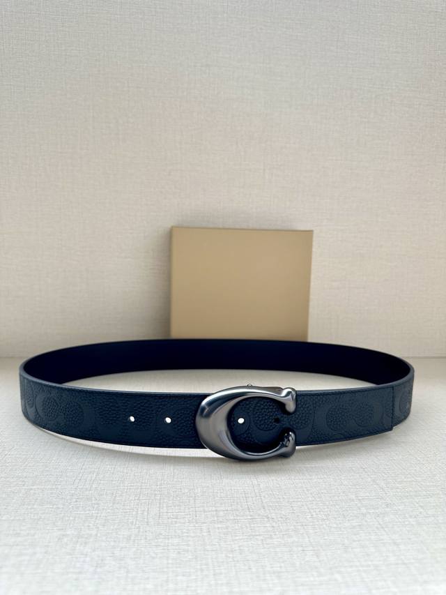 3.7cm wide Coach reversible belt is crafted from sporty calfskin and features a
