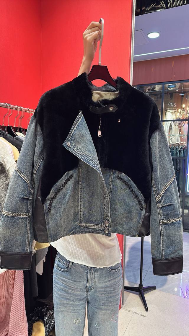 Balenciaga* Heavy-duty beaded leather and down-filled distressed denim with whi