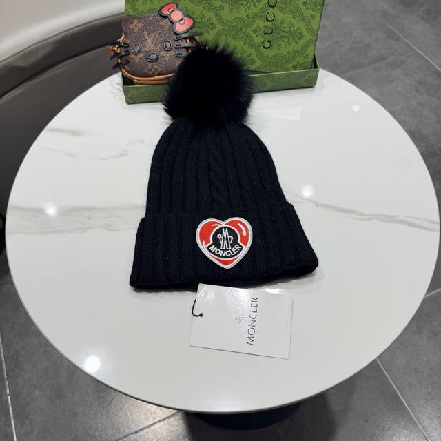 Moncler. Classic Moncler knitted beanie with fabric label! A winter favorite fo