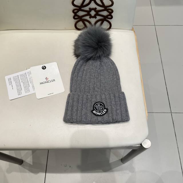 Moncler. Wool cap - with fox fur pom-pom made from custom-supplied wool! A prec