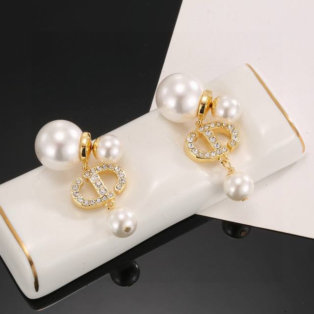 Dior Letter Pearl Earrings. These Dior Tribales earrings offer a fresh take on