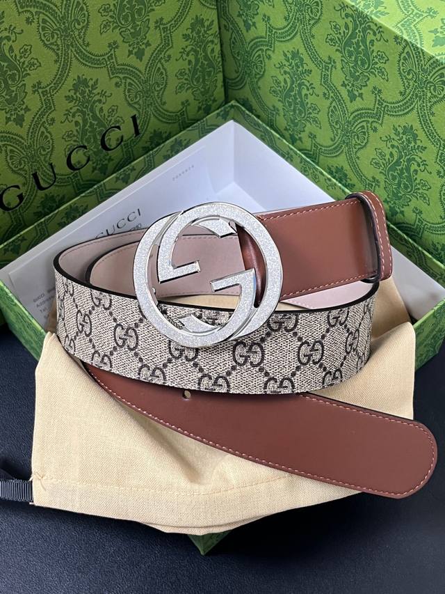 Features the brand's signature double-G monogram pattern in a beige-ebony color Features the brand's signature double-G monogram pattern in a beige-ebony color