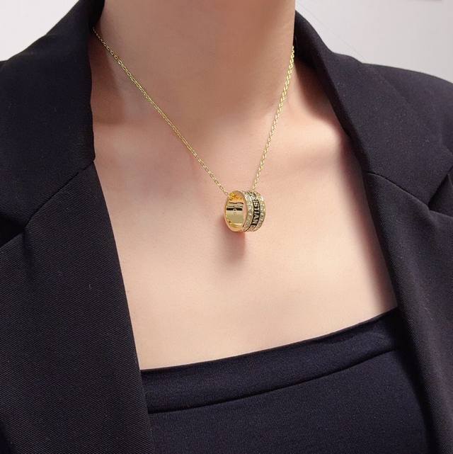 Dior's latest diamond-encrusted letter ring, pendant, and necklace are incredib