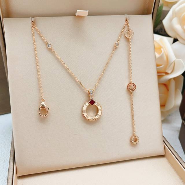 Bx047 This is the latest rose gold round coin necklace from Bvlgari, made of the