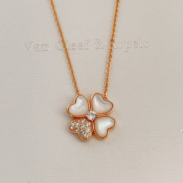 Vancleef*Arpel* Four-Leaf Clover Rose Gold Heart Necklace is made of the same br
