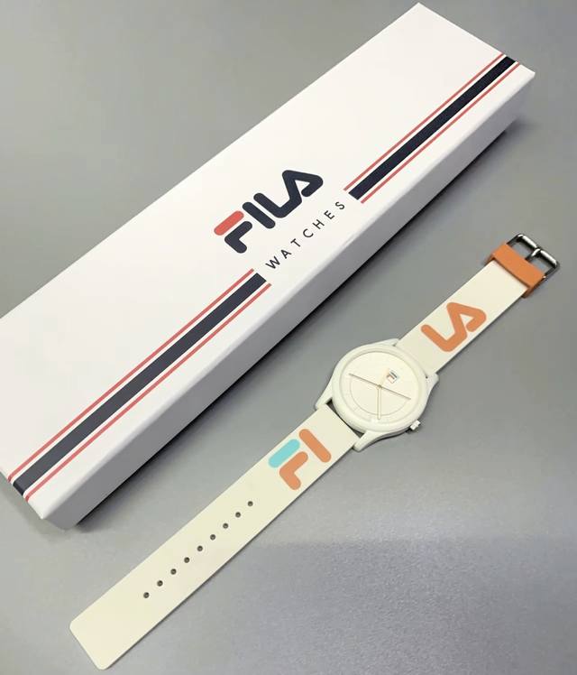 The Fila silicone strap is soft and doesn't hurt her hand. Plus, this color is