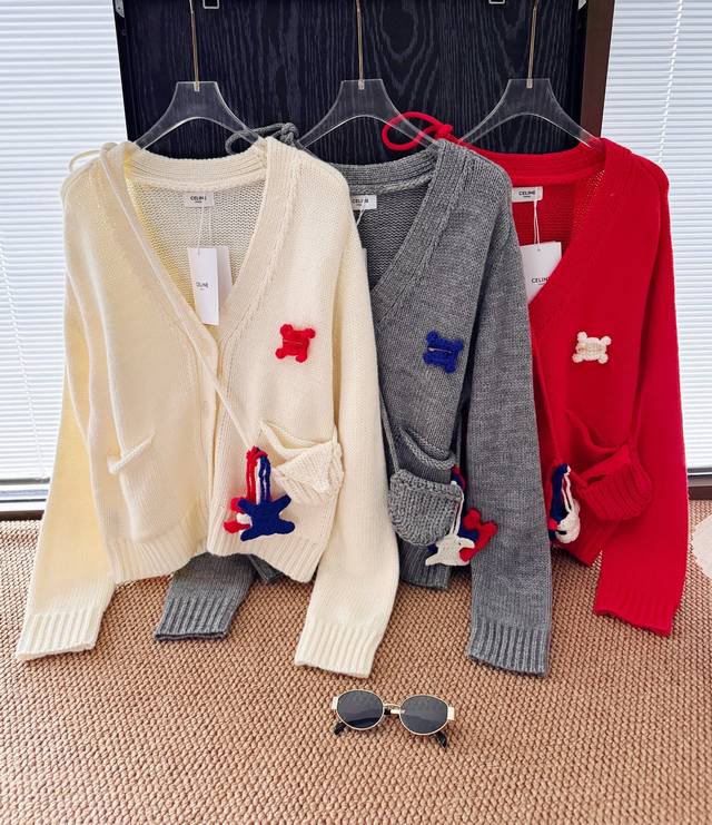 Price: ? DDD Product Name: Celin* Arc de Triomphe Logo Wool Knit Cardigan with S