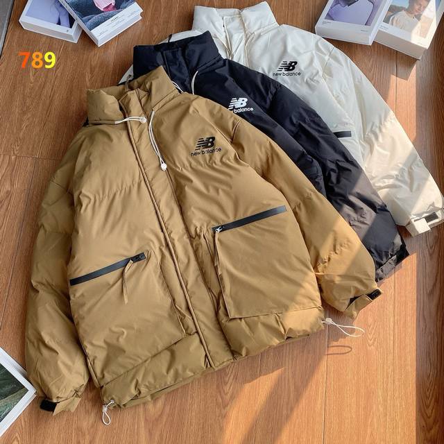 New Balance Japanese-style workwear jacket with large pockets, hollowed-out lett