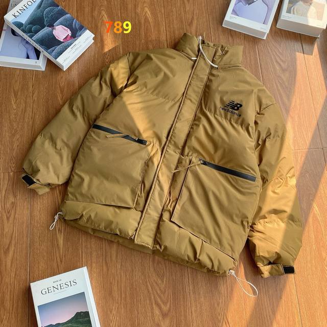 New Balance Japanese-style workwear jacket with large pockets, hollowed-out lett