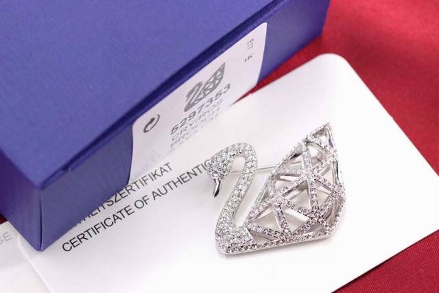 Swarovski Openwork Swan Brooch DDD This brooch features Swarovski's swan logo an