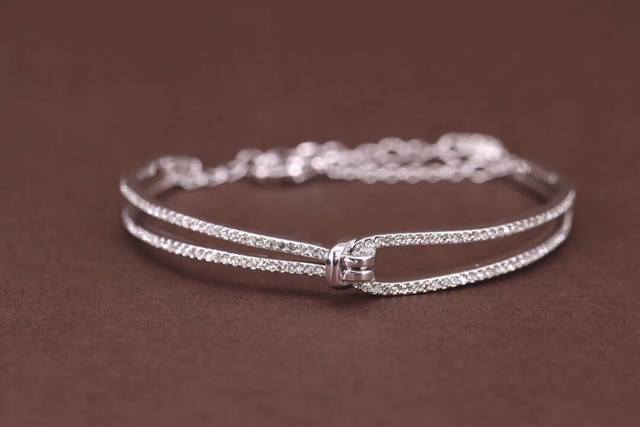 Swarovski Jiang Shuying's Rose Gold Knot Bracelet DDD This knot design symbolize