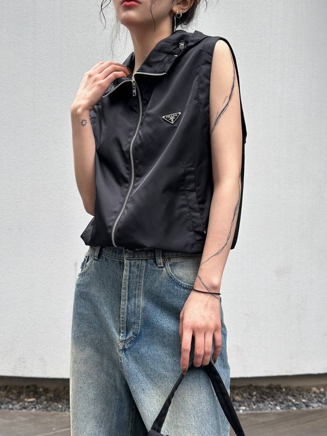 P brand vest, classic recycled nylon fabric, custom hardware logo on the chest, P brand vest, classic recycled nylon fabric, custom hardware logo on the chest,
