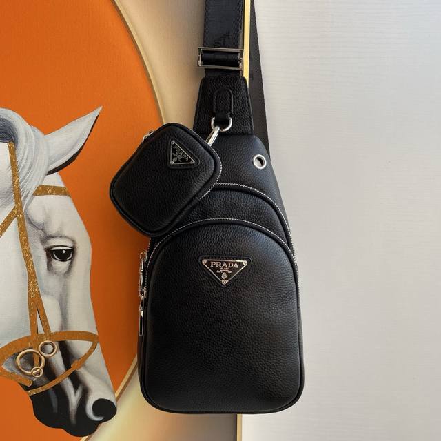 Latest Prada style, men's chest bag. Crafted from premium top-grain cowhide, it