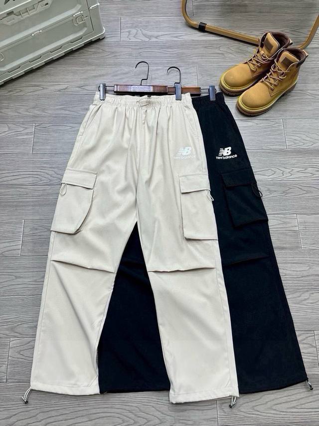 New Balance Multi-Pocket Cargo Pants New Balance's popular Japanese-style multi-