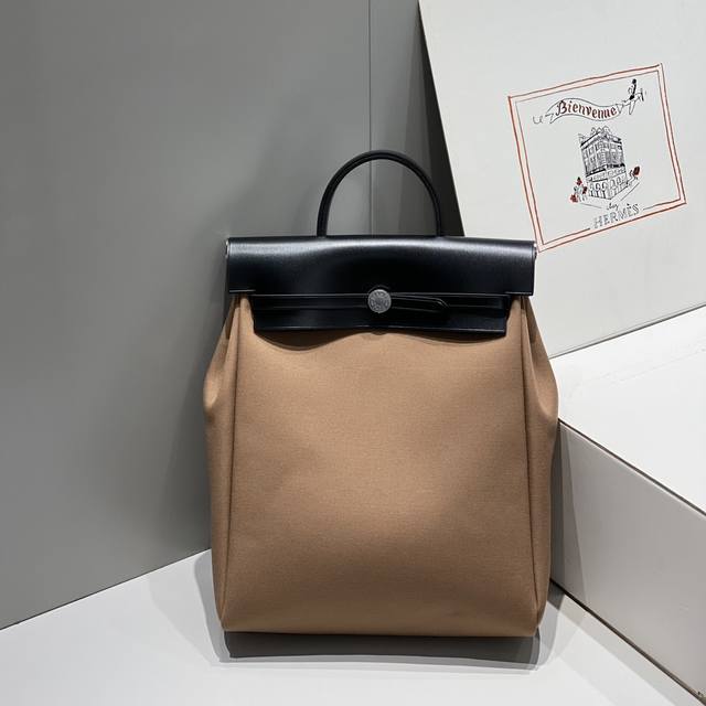 Elephant Grey Herbag A Dos Zip Canvas Backpack. The design is versatile and flat