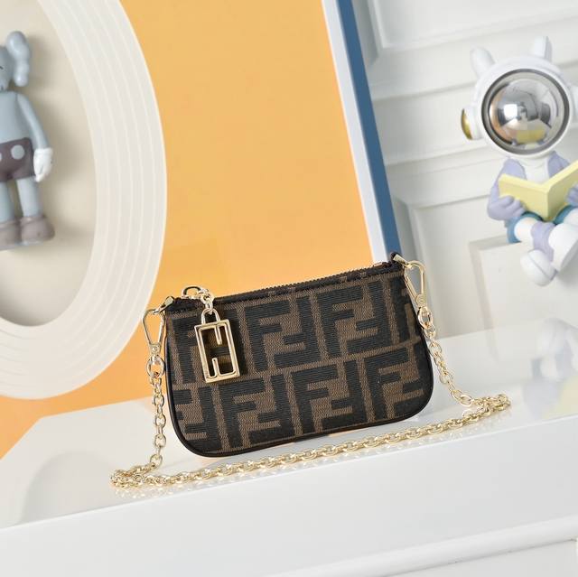 Fendi Mini Bag A small and portable mini bag with a zipper closure and the iconi