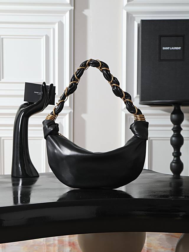 Amalia Hobo Croissant Bag A brand new handbag with a bohemian style, giving off