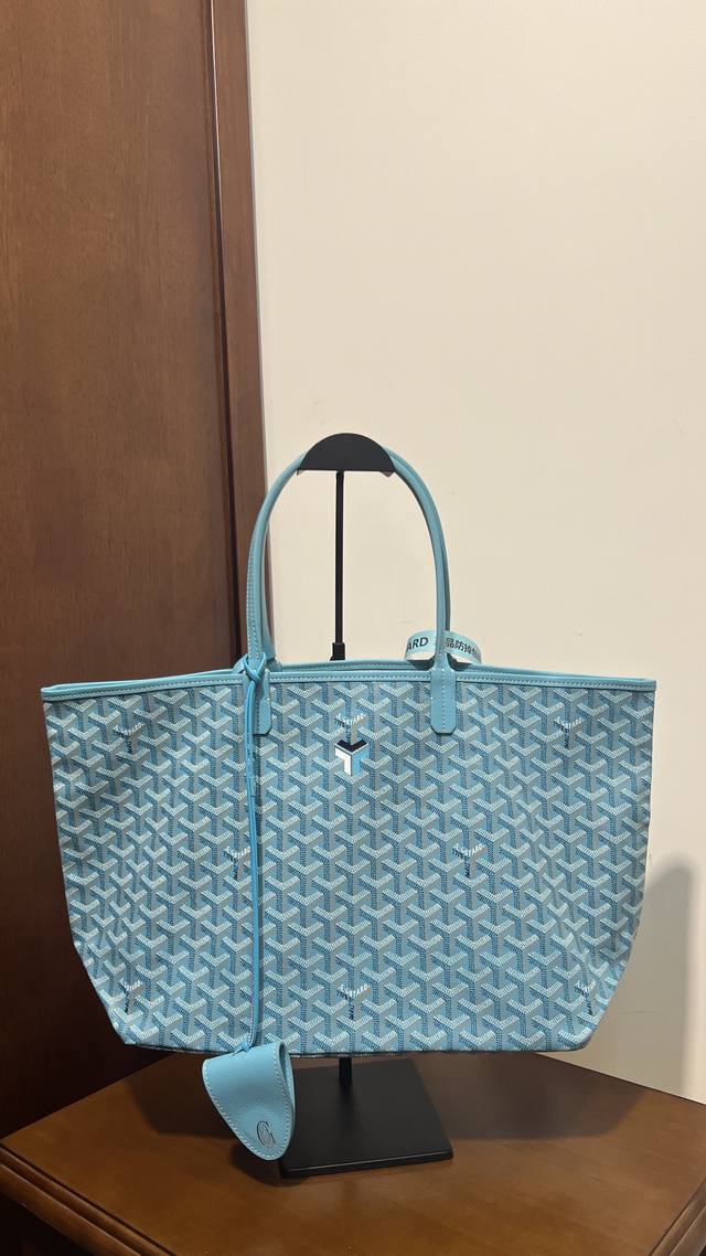 The picture shows the small Goyard Turquoise special edition, now available! A m