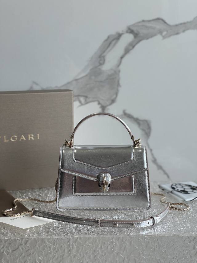 The Serpenti Forever mini handbag, crafted from calfskin, combines modern style