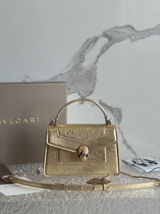 The Serpenti Forever mini handbag, crafted from calfskin, combines modern style