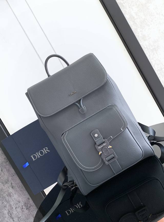 This saddle-style flap backpack features a stylish, original design that highlig