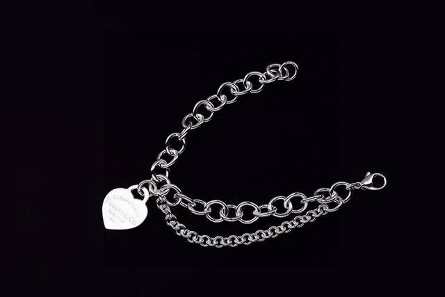 Tiffany & Co. Heart-Shaped Pin Buckle Bracelet. This uniquely designed heart-sha