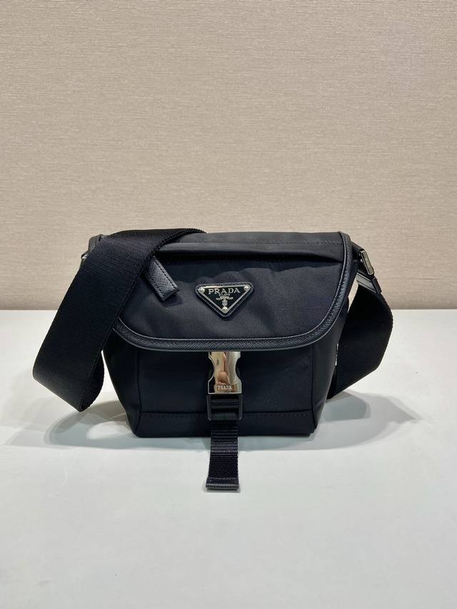 New Mini Messenger Bag 2Vd070 This mini messenger bag is crafted from Saffiano l