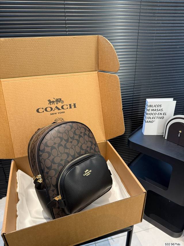 Coach Backpack with Airplane Box. This backpack can be carried by hand or worn o