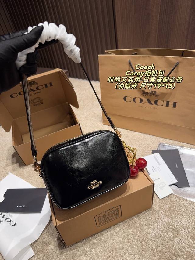 Comes with a box measuring 19*13mm. Coach Carey camera bag. Classic Signature co
