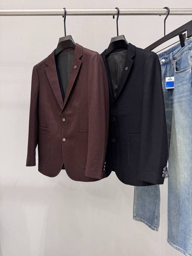 This is a Zegna 2025 Autumn/Winter men's wool suit jacket, made to top-tier read