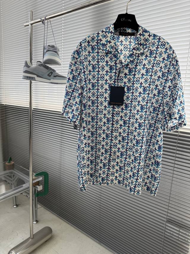 Top and Shorts - Louis Vuitton Spring/Summer 2026 Short-Sleeve Shirt in vibrant,