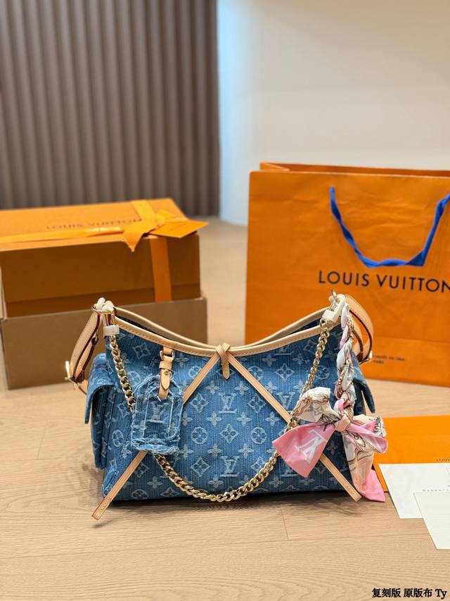 Replica Original Denim Carryall Handbag LV. This new denim Carryall handbag feat