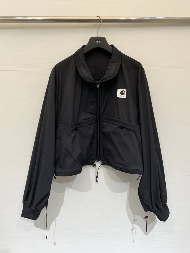 Sacai Spring/Summer 2026 Collaboration Short Color-Blocked Jacket. Olive green n