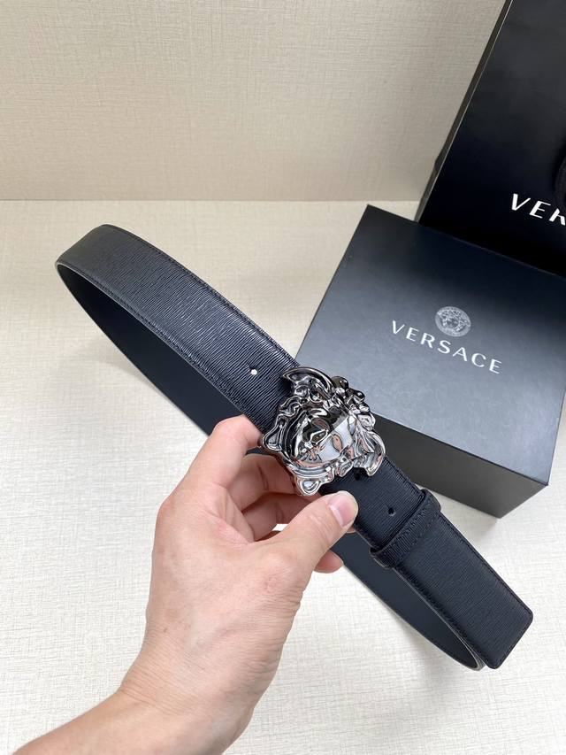 Versace, 3.8cm wide. This stylish belt is crafted from grained calfskin leather