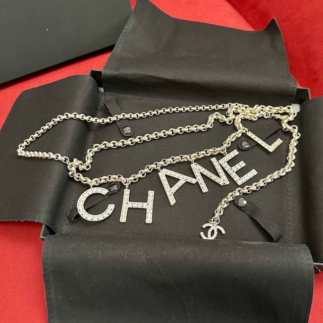 Chanel's newest design, featuring a crystal-encrusted double C logo with a regul Chanel's newest design, featuring a crystal-encrusted double C logo with a regul
